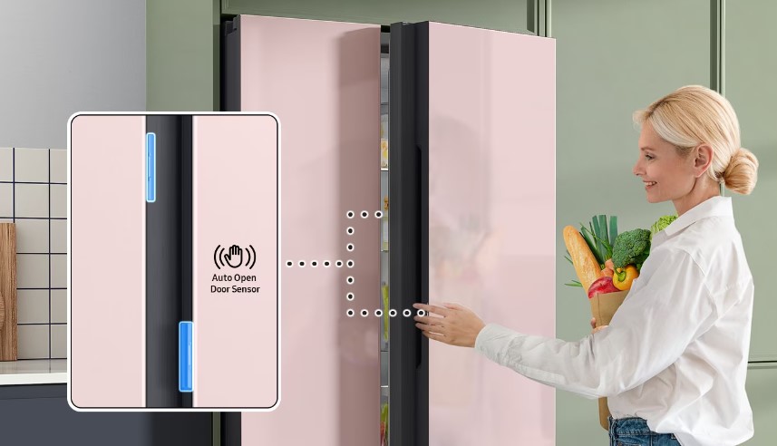 A women opening Samsung Side By Side Refrigerator with the help of AOD (Auto Open Door) Feature